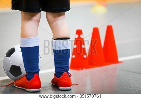 Children Playing Football In School Gymnasium. Indoor Soccer - Futsal Training For School Kids. Foot