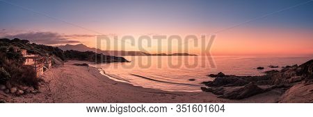 Panoramic View Of Sun Setting Over The Golden Plage De Sainte Restitude Beach In The Balagne Region 