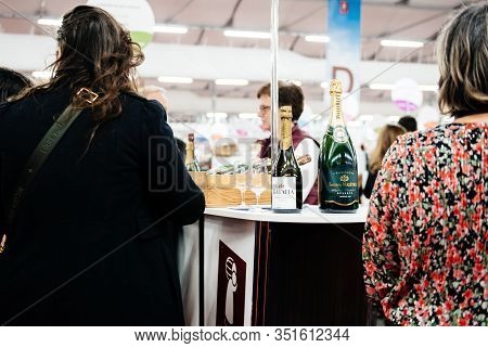 Strasbourg, France - Feb 16, 2020: People Near Stand With Ratafia And Frederic Maletrez Champagne Bo