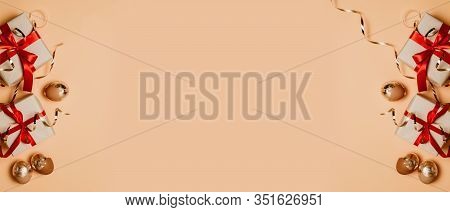 Top View Easter Gold Brown Eggs Surprise Gift With Silk Red Bow With Copyspace On A Beige Background