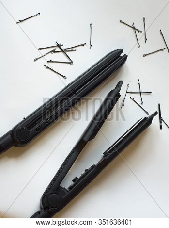 Electric Curling Iron On White Background.top View
