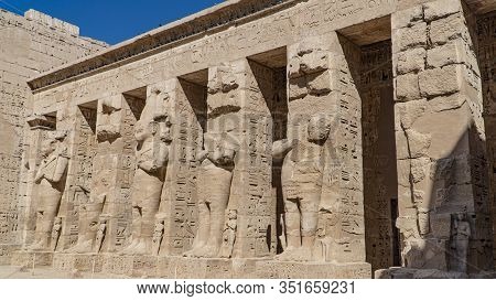 Temple Of Medinet Habu. Egypt, Luxor. The Mortuary Temple Of Ramesses Iii At Medinet Habu Is An Impo