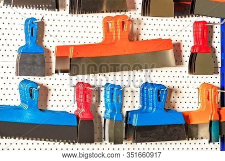 Steel Spatulas And Scrapers Of Various Shapes And Purposes, Serrated And Polished, With Plastic Hand