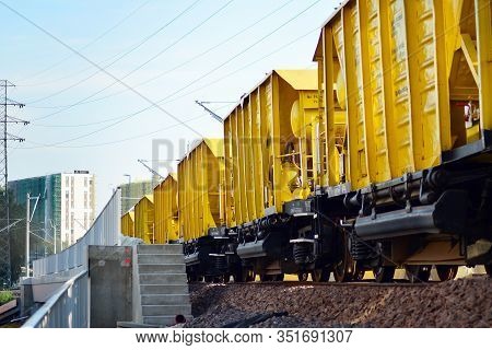 Cargo Train At The Station In City