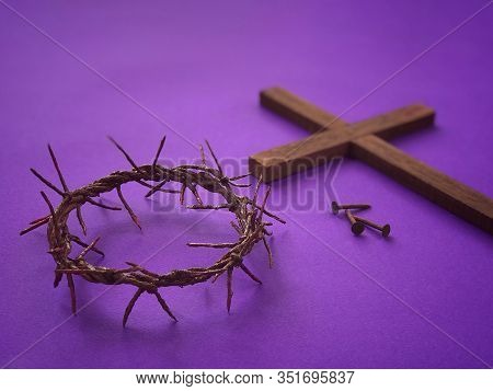 Good Friday, Lent Season And Holy Week Concept - A Woven Crown Of Thorns And Blurry Images Of Three 