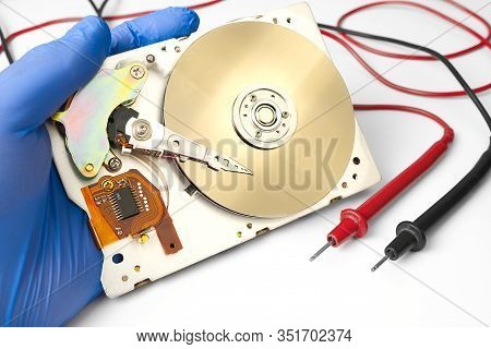 Hdd - Hard Disk Drive. Hard Disk Repair Concept. The Hard Drive Is Designed To Store Data Of All Man