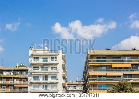 South European Mediterranean City Street Urban View With Apartment Buildings Symmetry Facade In Summ