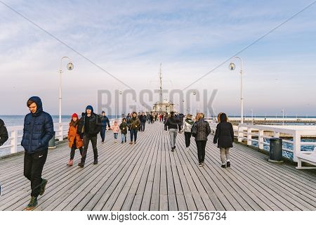 Wooden Pier In Sopot In The Spring. Good Windy Weather. Winter Day On Old Wooden Pier In Sopot, Pola