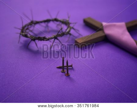 Good Friday, Lent Season, Ash Wednesday And Holy Week Concept. Three Rusty Nails, A Woven Crown Of T