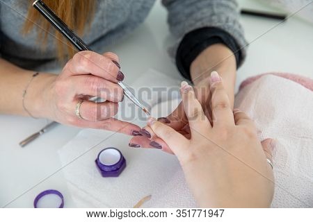 Manicure Process In Beauty Salon - Woman Hand Nails Care.