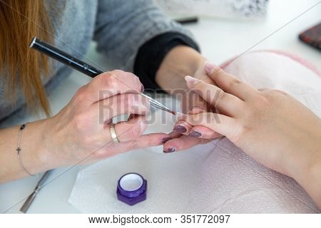Manicure Process In Beauty Salon - Woman Hand Nails Care.