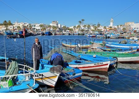 Mahdia, Tunisia - December 26, 2019: The Fishing Port With Colorful Fishing Boats And The City Of Ma