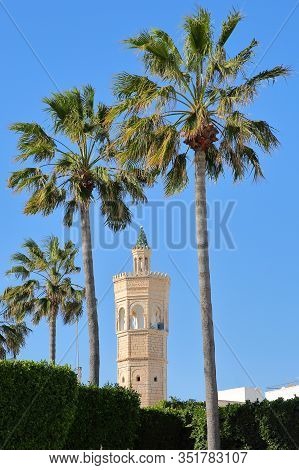 Close-up On The Minaret Of Soliman Hamza Mosque Surrounded By Palm Trees In The City Of Mahdia, Tuni