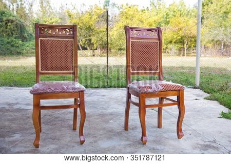 C Lassic Brown Chair. Wooden Chair Green Background . Old Chair On Nature Background . Old Style Woo