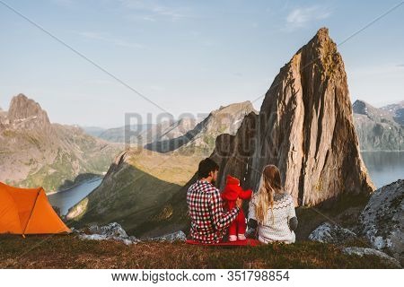 Family Camping Mother And Father With Baby Travel Vacations In Mountains Adventure Healthy Lifestyle