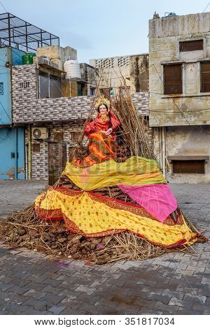 Vrindavan, India - March 20, 2019: Effigy Of Goddess Holika On Woods Going To Burn On The Night Of H