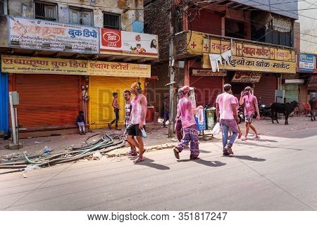 Vrindavan, India - March 21, 2019: Indian People In Different Colours Celebrate Traditional Holi Fes