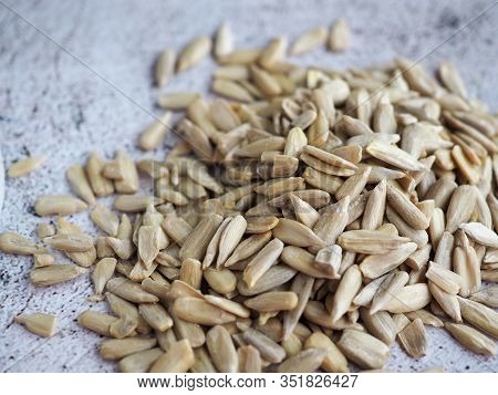 Sunfower Seeds Close Up On Rustic Grey Background.