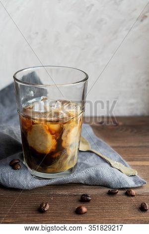 Milk Mixed With Coffee In A Glass