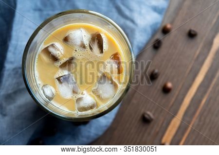 Glass Of Black Coffee With Ice Closeup