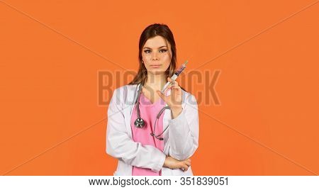 Nurse Make Injection. Health Worker Dials Vaccine In Syringe. Physician Or Therapist Giving Vaccine 