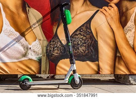 Bucharest, Romania - September 09, 2019: A Lime-s Electric Scooter Is Parked On A Sidewalk In Front 