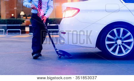 Security Personnel Are Checking Safty Under The Car. Befor Entering The Hotel Parking Lot, Noise