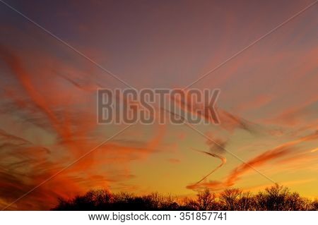 Colorful Biautiful Sunset Sky With Few Clouds For Wallpaper.