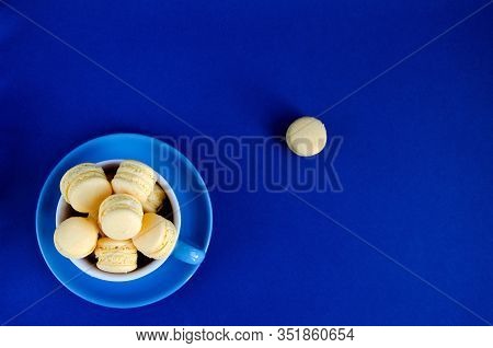 Macaroons In A Blue Cup On A Blue Background, The Color Trend Is 2020, The Trend Of The Cup Is On To
