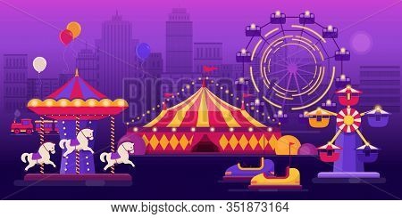 Amusement Park On City Landscape Background At Night With Carousels, Ferris Wheel And A Circus Tent.