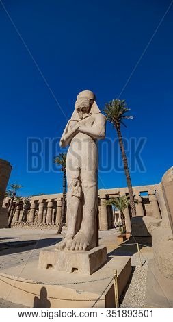 Karnak Temple In Luxor, Egypt. The Karnak Temple Complex, Commonly Known As Karnak, Comprises A Vast