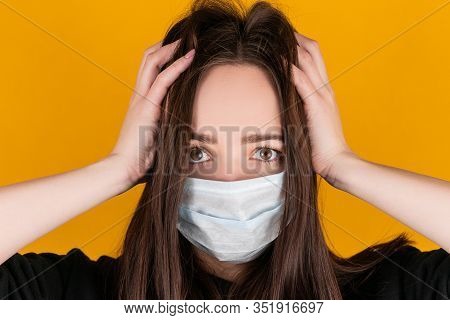 Girl in a medical mask. coronavirus. Health Protection Methods