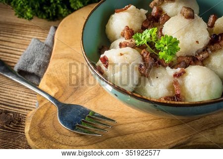 Meat Stuffed Potato Dumplings With Fried Onion And Greaves.