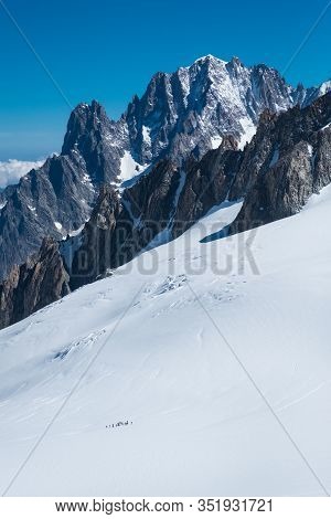 Landscape Shooted From The Clabeway Station Of Punta Helbronner In A Sunny Day With Blue Sky And Mou