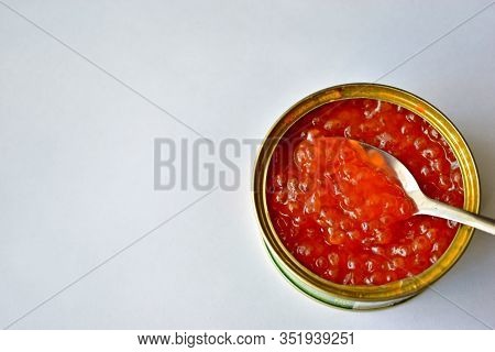 The Large Jar Of Red Caviar With The Spoon
