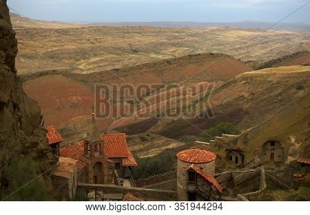 Beautiful Autumn View Of David Gareja Monastery Complex On Background Of Colorful Desert Hills, Geor