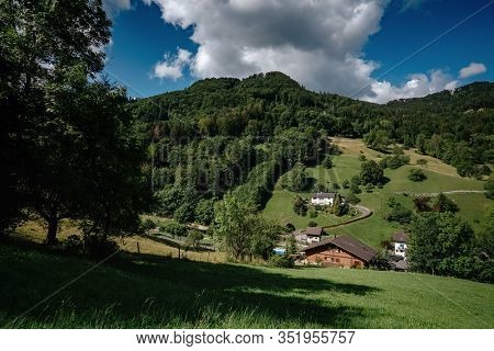 Summer View Of A Beautiful Apline Village In Switzerland