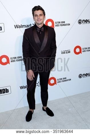 LOS ANGELES - FEB 9:  Antoni Porowski at the 28th Elton John Aids Foundation Viewing Party at the West Hollywood Park on February 9, 2020 in West Hollywood, CA