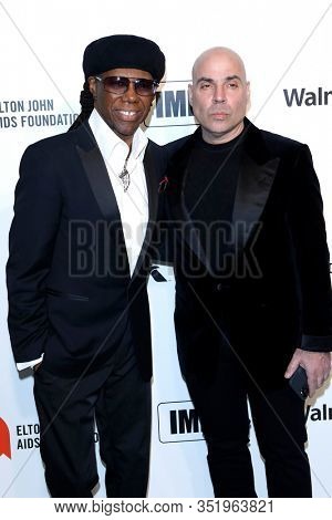 LOS ANGELES - FEB 9:  Nile Rodgers, Merck Mercuriadis at the 28th Elton John Aids Foundation Viewing Party at the West Hollywood Park on February 9, 2020 in West Hollywood, CA