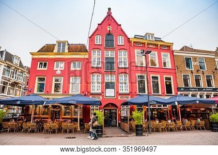 Utrecht, Netherlands - January 07, 2020. Pink-red House Of Traditional Architecture As A Pub