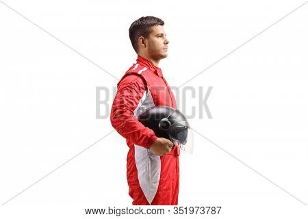 Racer in a red jumpsuit standing and holding a halmet isolated on white background