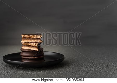 Alfajor With Dulce De Leche Cake, Argentine Dessert With Chocolate And Caramel.