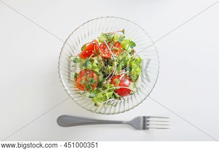 The Healthy Vegetarian Salad On White Table