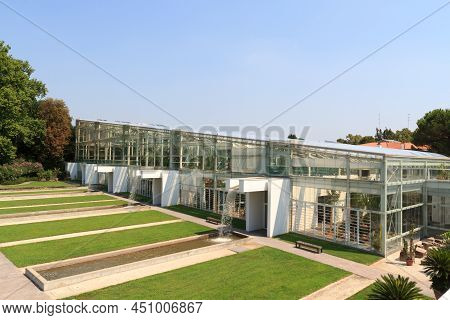 Padua, Italy - August 11, 2020: Greenhouse With Artificial Waterfalls In Botanical Garden (orto Bota