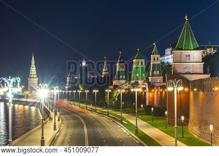 Towers Of Moscow Kremlin Along Kremlevskaya Embankment At Night, Russia