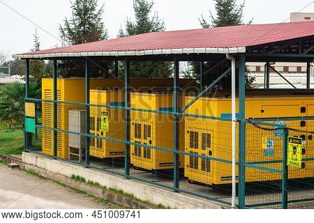 Industrial Electric Generator For Electric Power In Cage With Roof