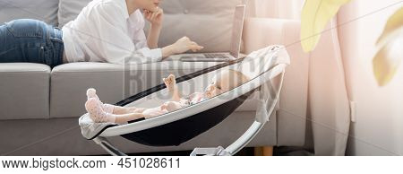 Baby Lies In Automatic Carrycot, Sunlight At Home