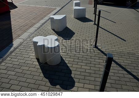 Smooth Concrete Chair-sized Castings. Suitable As An Urban Design Barrier To Enter The Pedestrian Zo