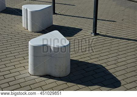 Smooth Concrete Chair-sized Castings. Suitable As An Urban Design Barrier To Enter The Pedestrian Zo