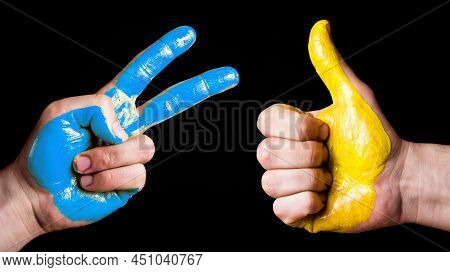 Ukraine Flag Color. Stop The War Background. International Support. Paint On Open Hand Symbolic Gest